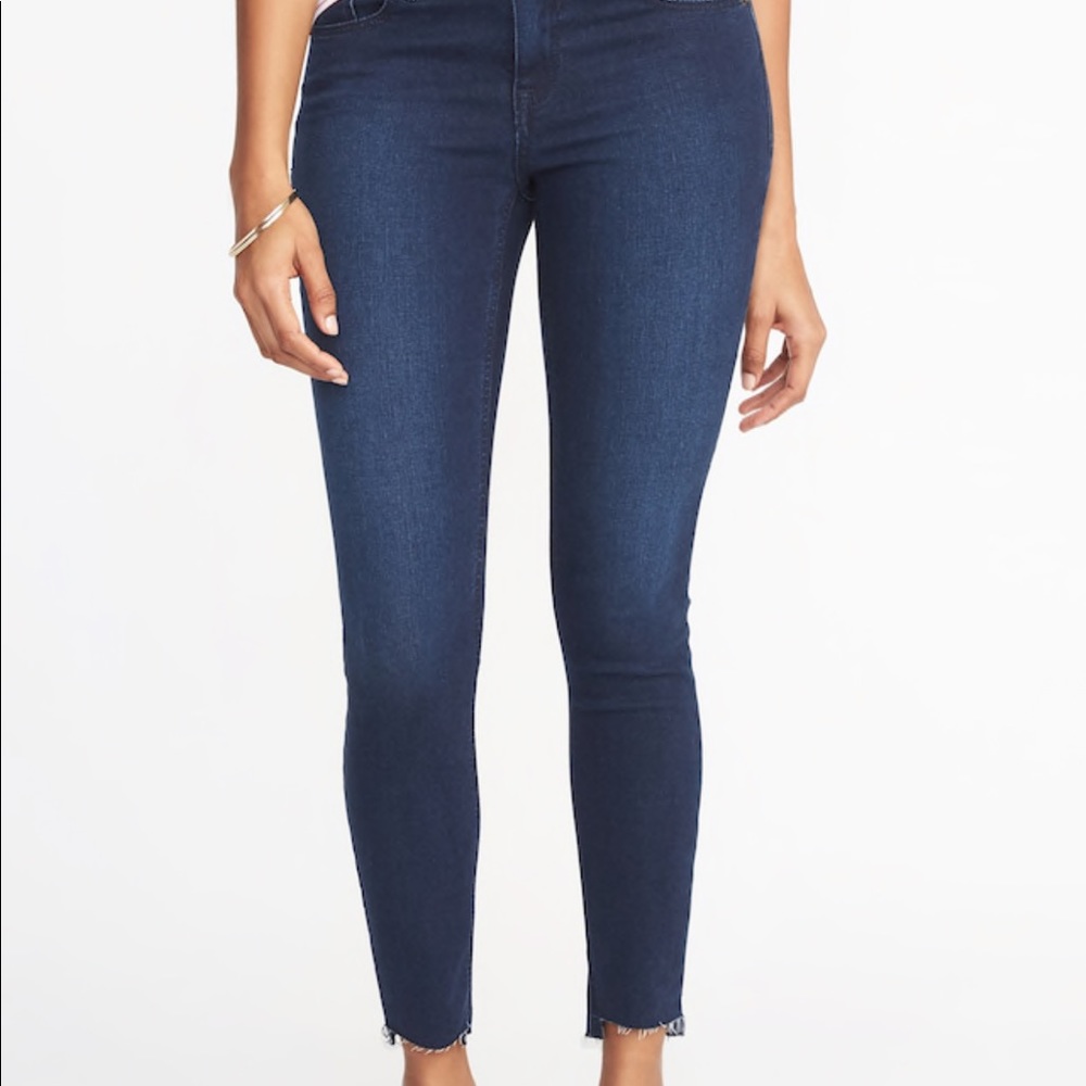 Mid-rise Rockstar super skinny step hem jeans. 12